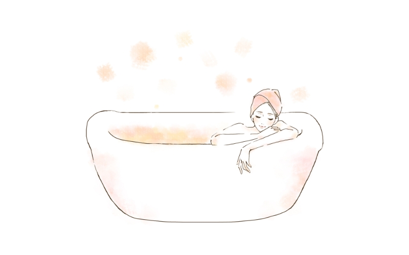 湯船に浸かる女性