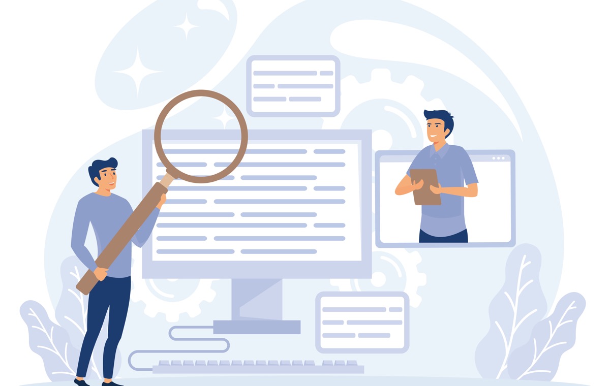 虫眼鏡を持つ男性