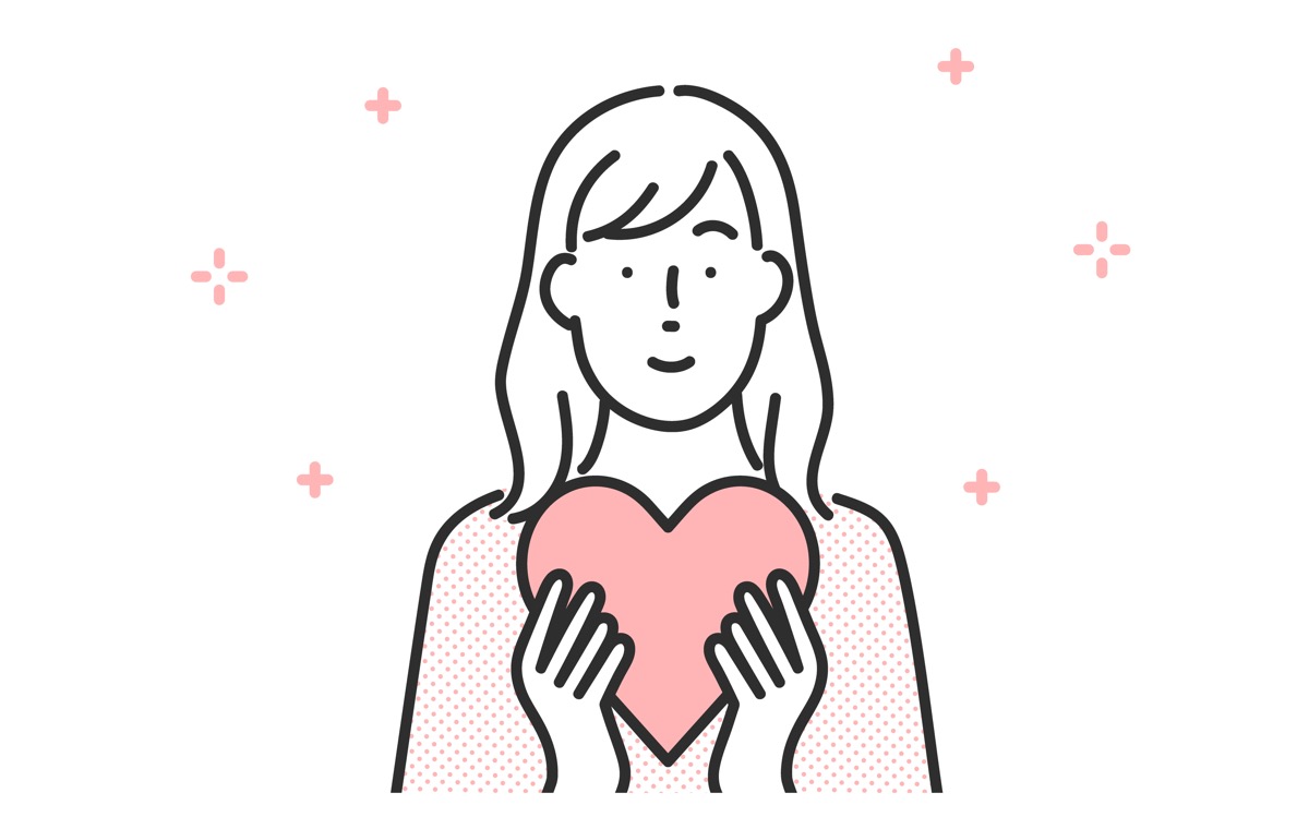 ハートを持つ女性