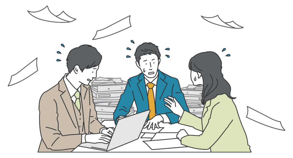 資料に囲まれて焦っている様子のビジネスチームのイラスト