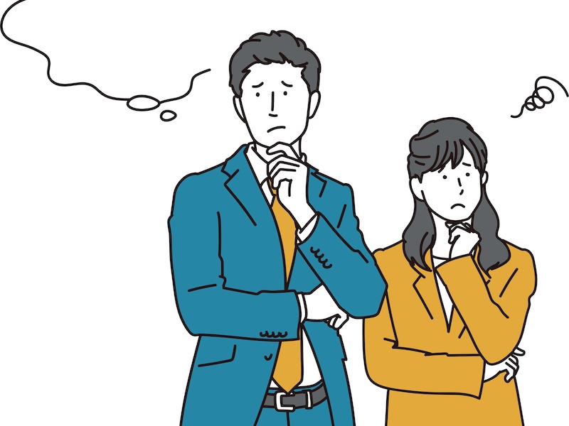 悩んでいる様子のビジネスパーソンのイラスト