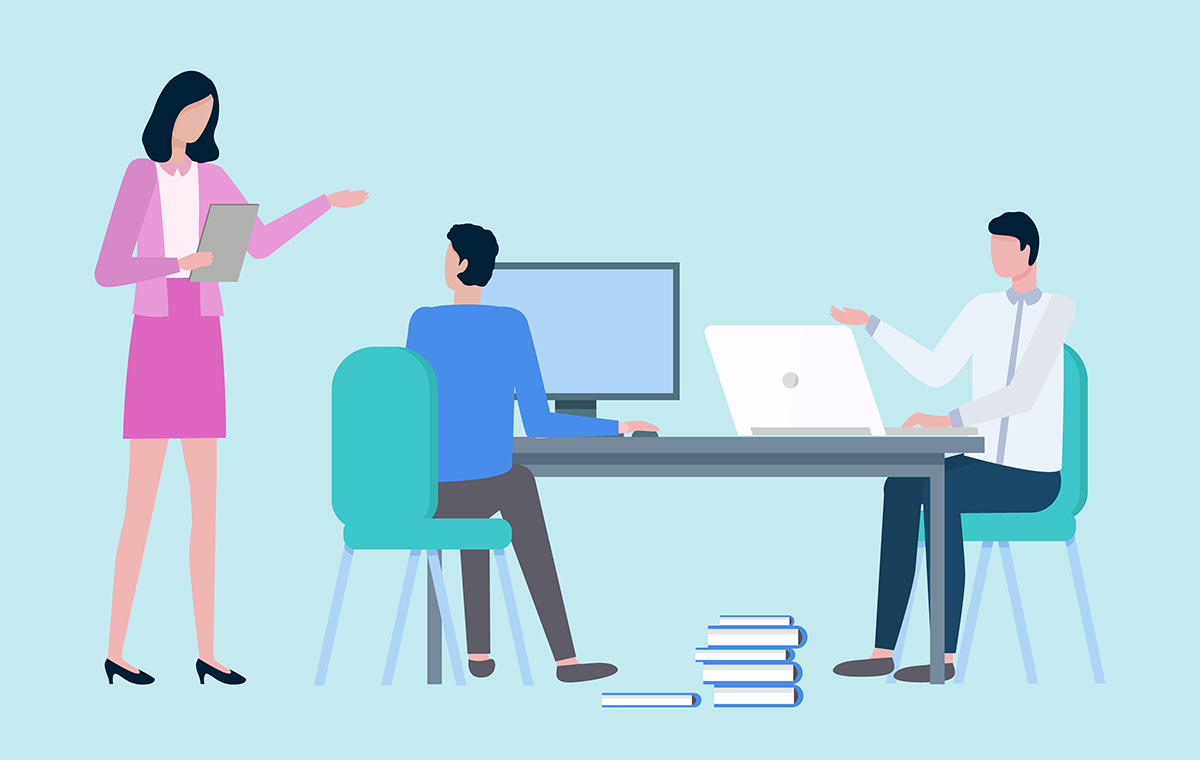 上司が部下2人に指示を出す様子