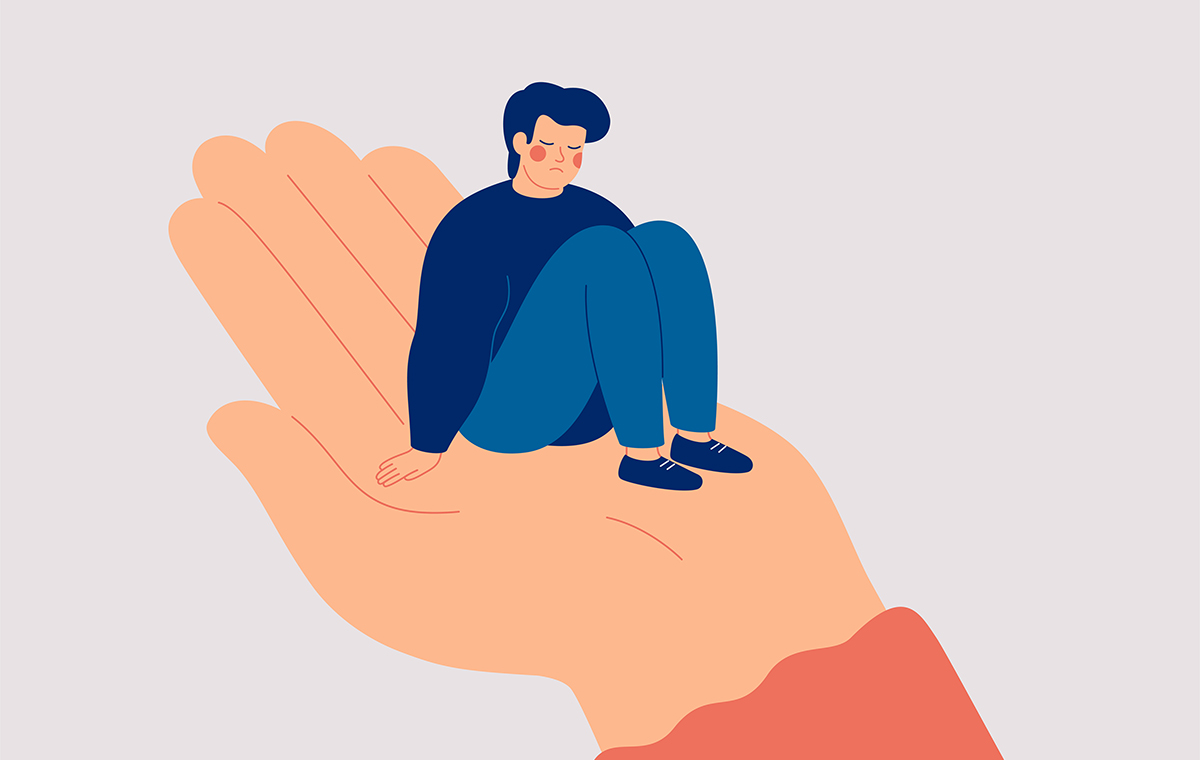 落ち込んだ様子の男性が手のひらに乗っているイメージイラスト