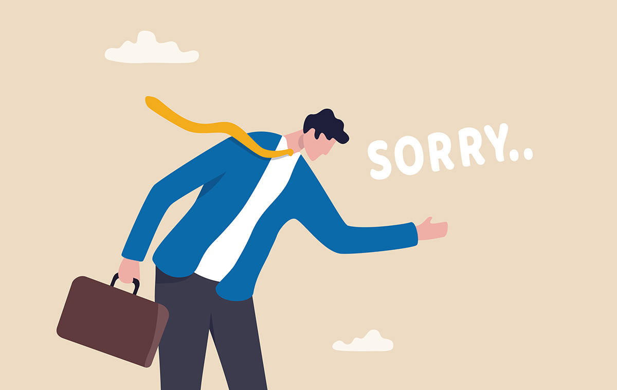 SORRYと謝るスーツ姿の男性のイラスト