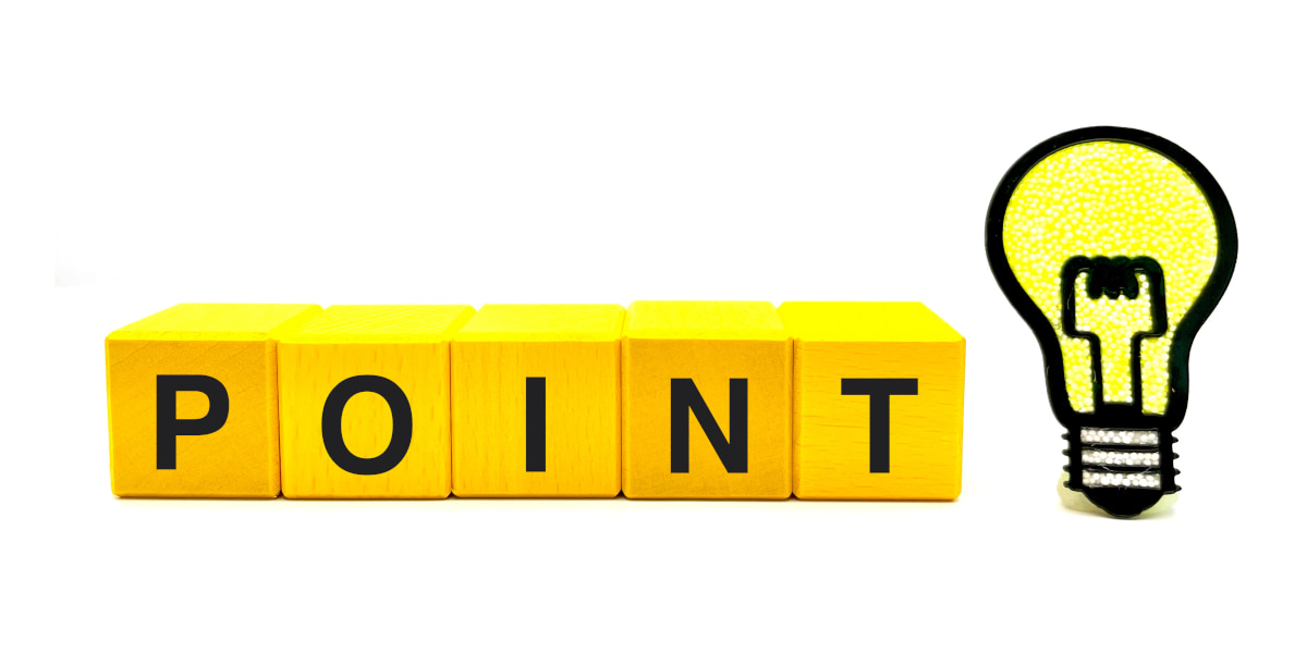 POINTという文字のブロックと電球のイラストの写真
