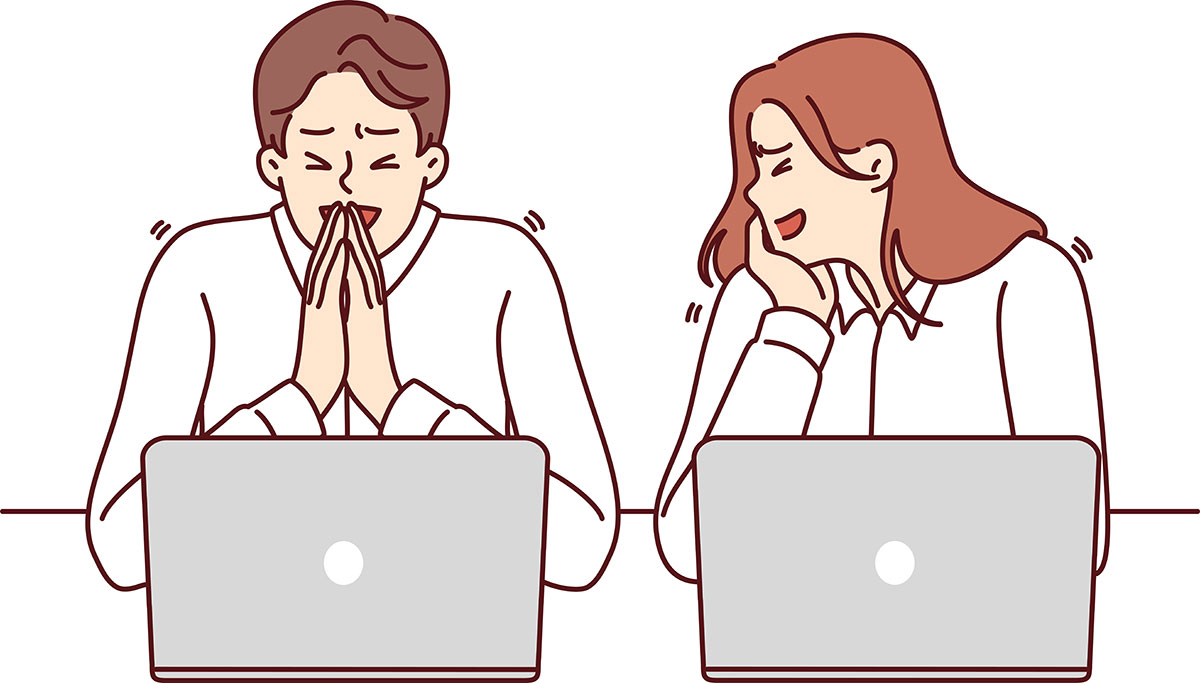 同僚同士で冗談を言い合っている