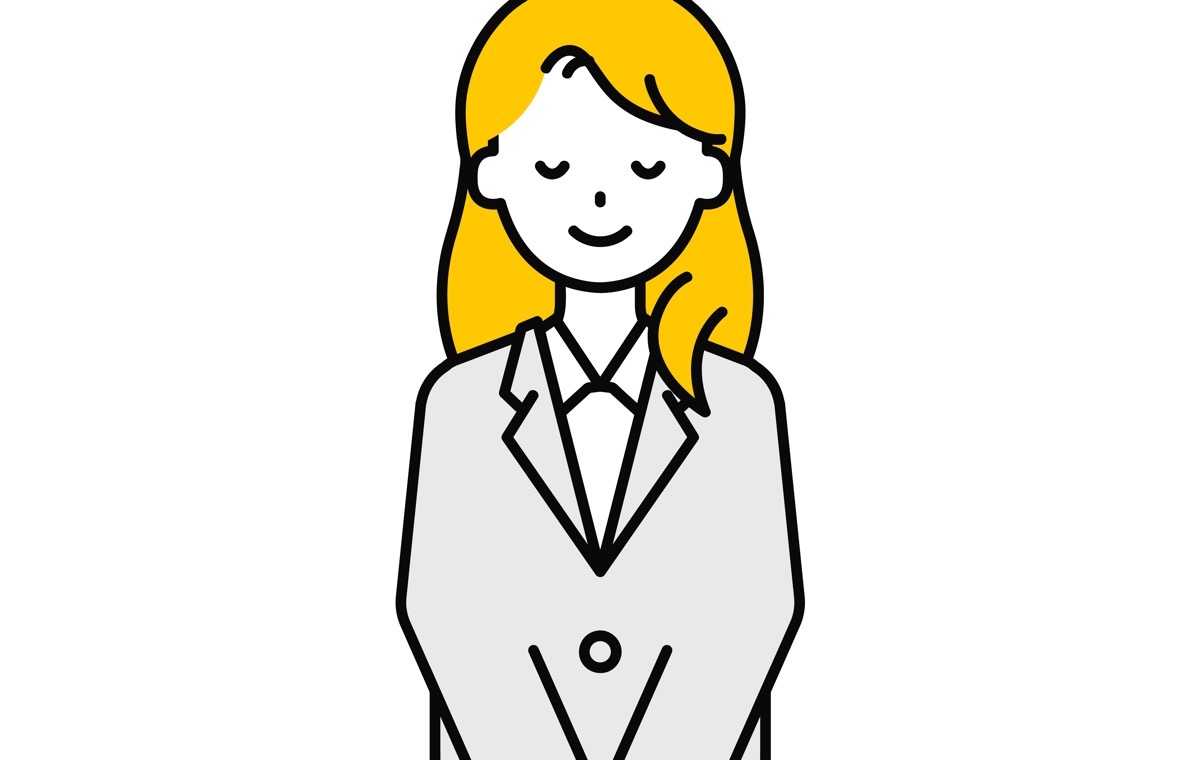 頭を下げる女性