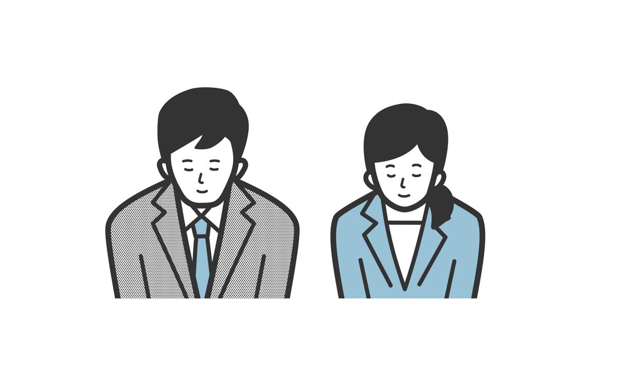 頭を下げる男女