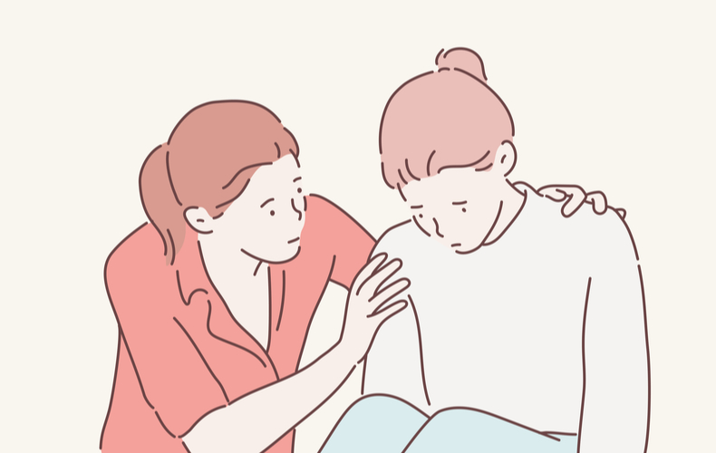 落ち込む人を元気づける様子