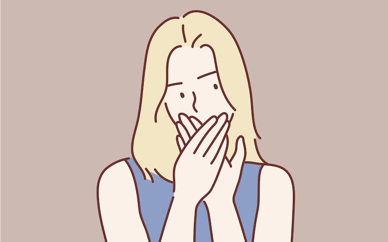 口を両手で覆っている人のイラスト