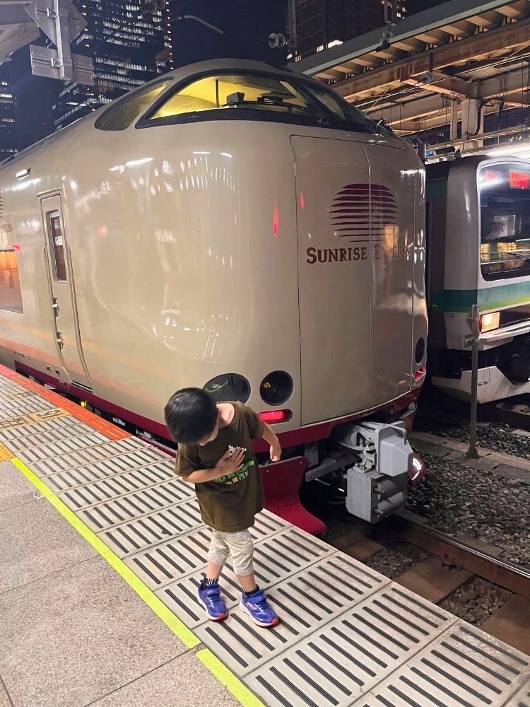 サンライズと息子さんの写真