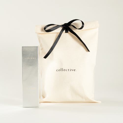 ルームスプレーの箱と白いギフト包装