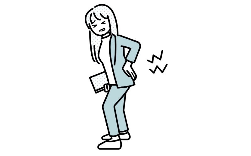 腰痛に悩む女性